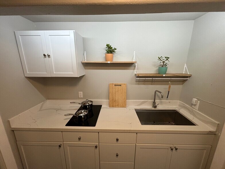 Quartz counter with stove top - 4460 Stanford Ave