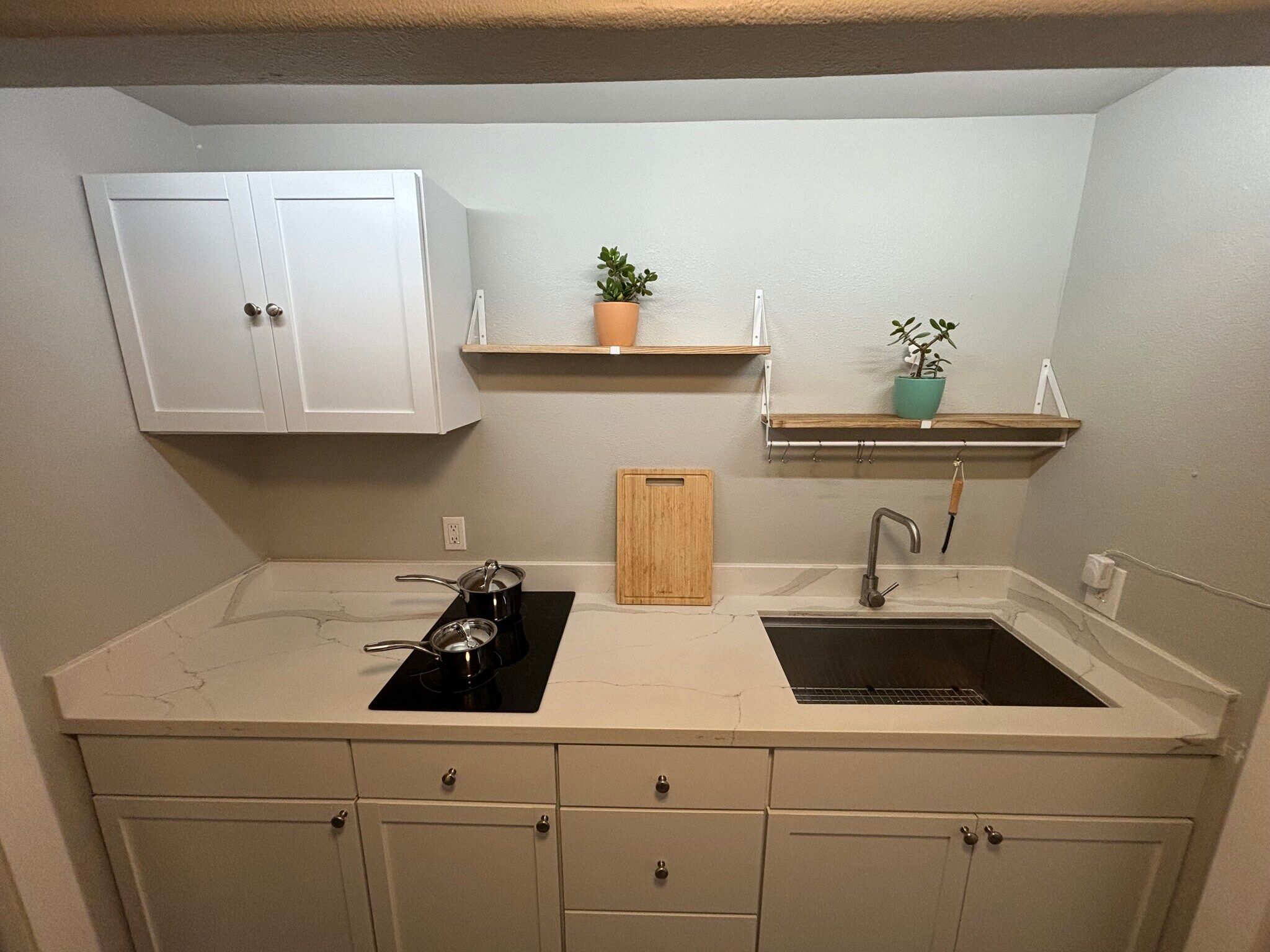 Quartz counter with stove top - 4460 Stanford Ave