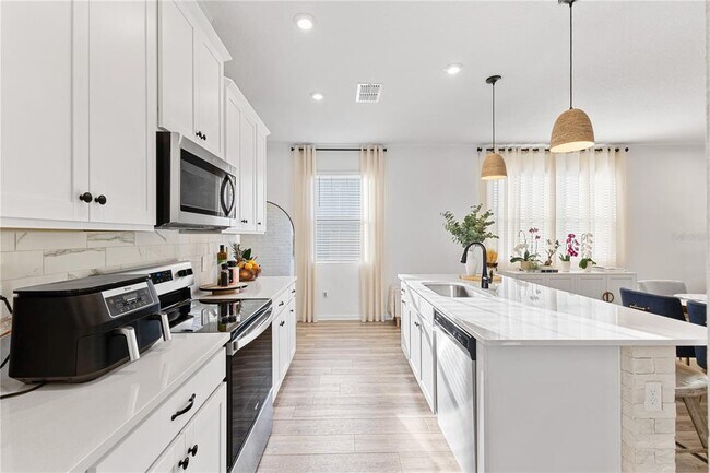 Building Photo - 3279 Canna Lily Pl
