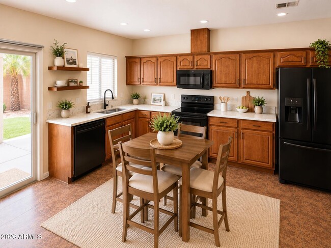 Building Photo - 8773 W Dahlia Dr