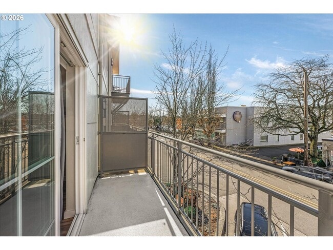 Building Photo - Main Street Living with Granite Kitchen, Gas Fireplace, and MAX Line Access