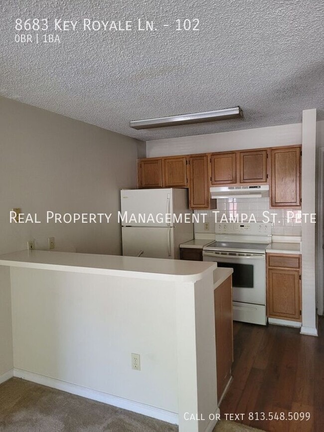 Building Photo - 8683 Key Royale Ln