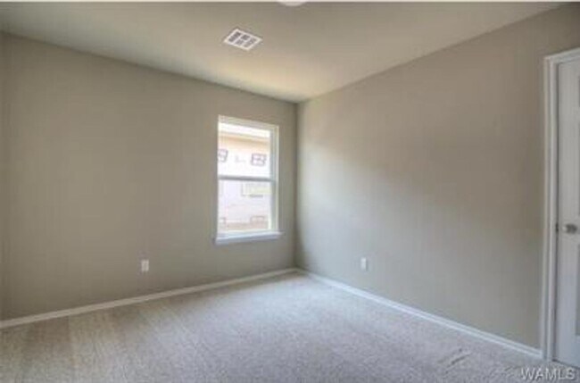 Building Photo - Stylish 4BR/2BA Home with Garage & Privacy...