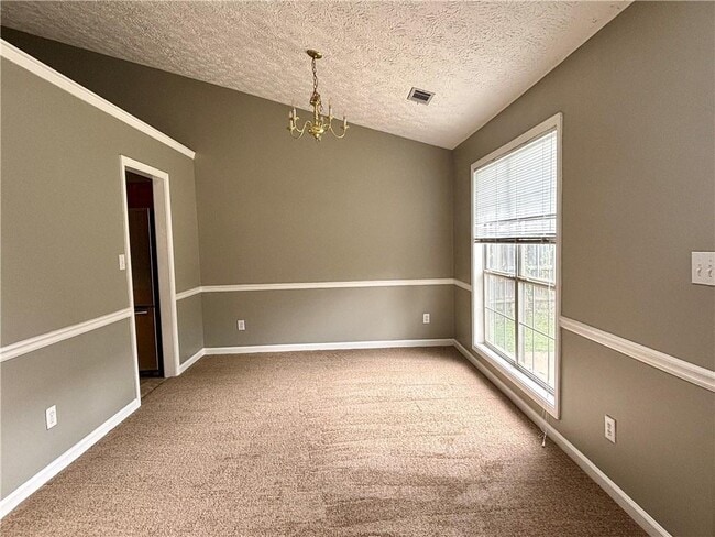 Building Photo - 2900 Camelot Woods Dr NW