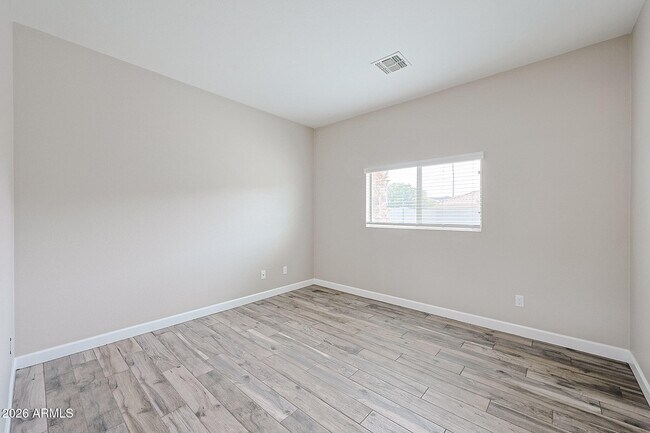 Building Photo - 15569 W Gelding Dr