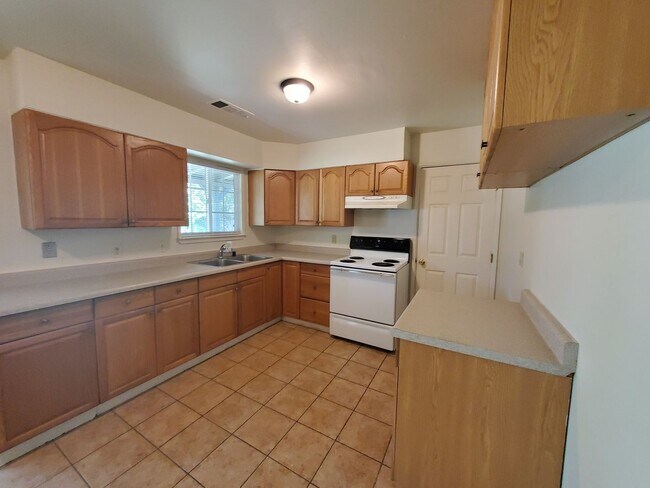 Building Photo - Price Reduced! 3 Bedroom 2 Bath House with Large Yard Available Now!