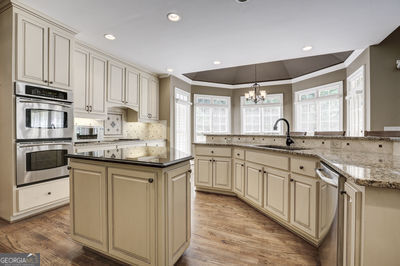 Building Photo - 9485 Nesbit Lakes Dr