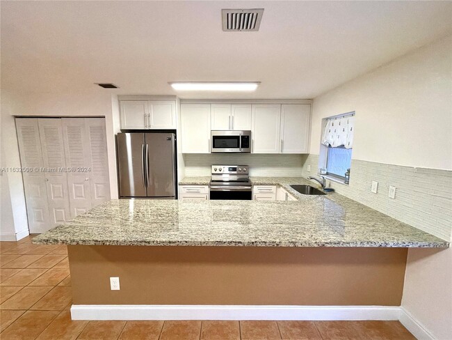 Building Photo - 4269 Coral Springs Dr