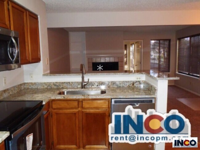 Building Photo - Light &amp; Bright 2 bed 1 bath Condo near...