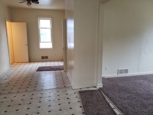 Building Photo - Spacious 5BR Home with Eat-In Kitchen | Upper Loft Area | Partially Fenced in Yard | 2,200 SQF