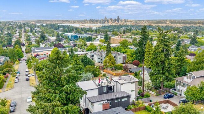 Building Photo - Hilltop Gem w/ AC and 360° Rooftop Views (1st Month Free)