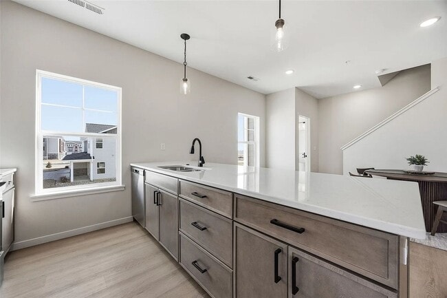 Building Photo - Big Ben at the Loop – Brand New 3 Bedroom Condo | Attached 2-Stall Garage
