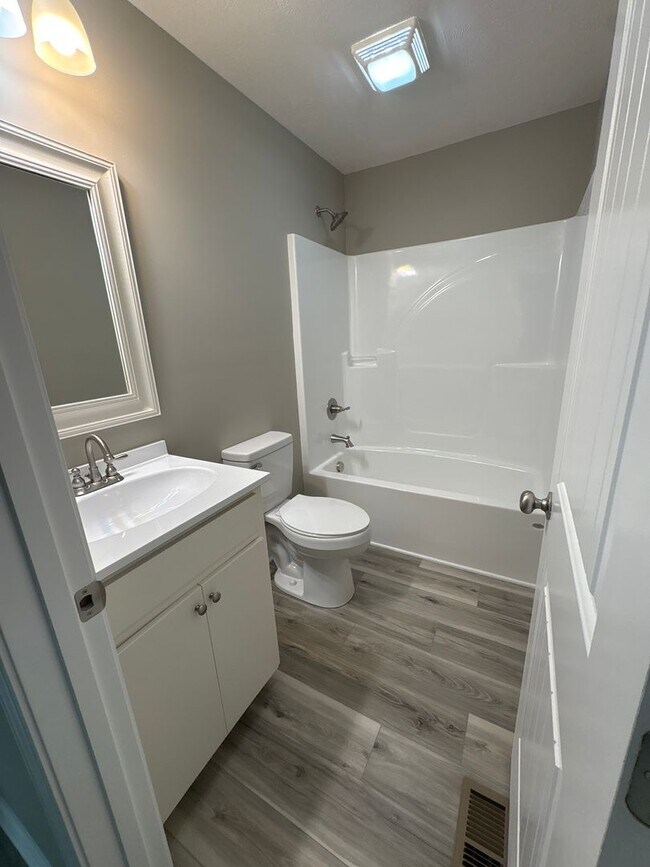 Building Photo - Charming New Home with a Rocking Chair Front Porch!