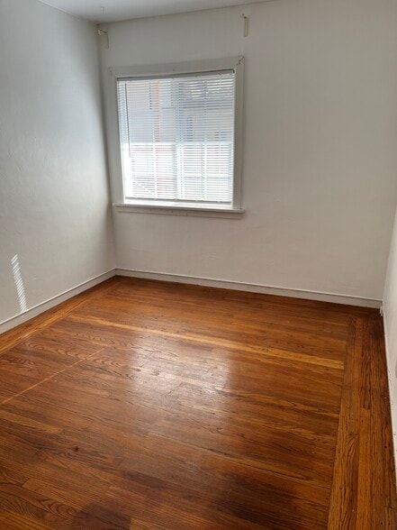 Bedroom -Sunny, fits a king bed. - 1329 Rose St