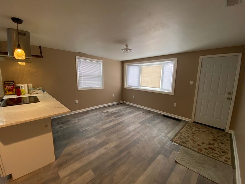 Living Room w/ Entry Door - 2850 S 35th St