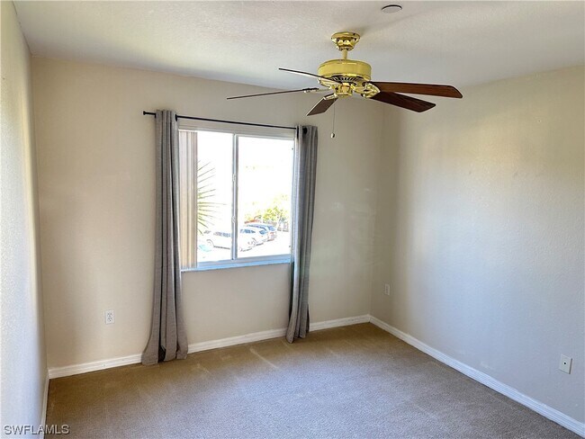 Building Photo - 8288 Key Royal Cir