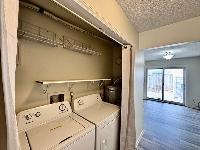 Building Photo - READY NOW!! Fenced Patio - Pet Friendly - Over 1,500 Square Feet!!