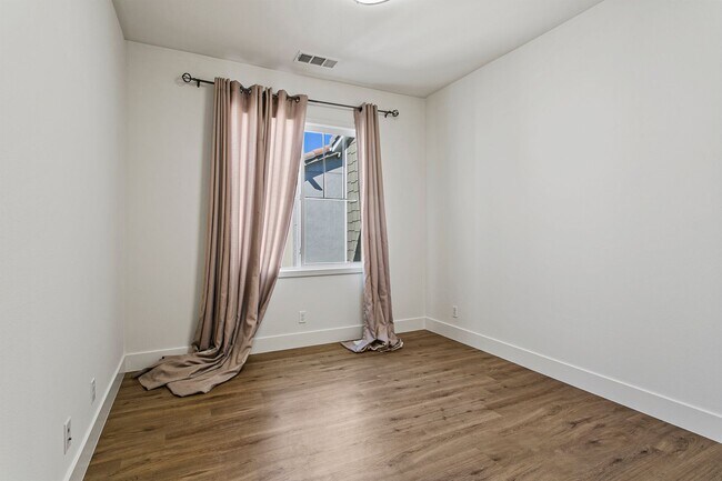 Building Photo - Stunning 4-Bedroom Home in Gated Tribella Community!