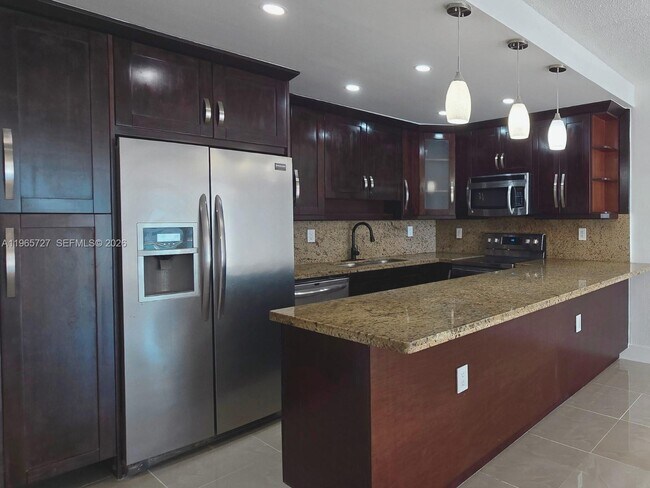 Building Photo - 19380 Collins Ave