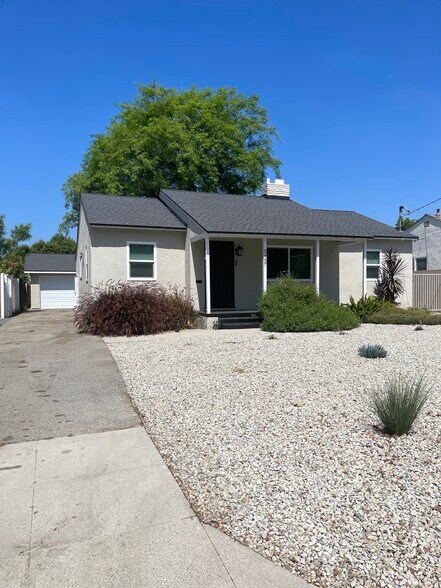6 Car Driveway with gated entrance leading to 2 Car Garage - 5457 Beck Ave