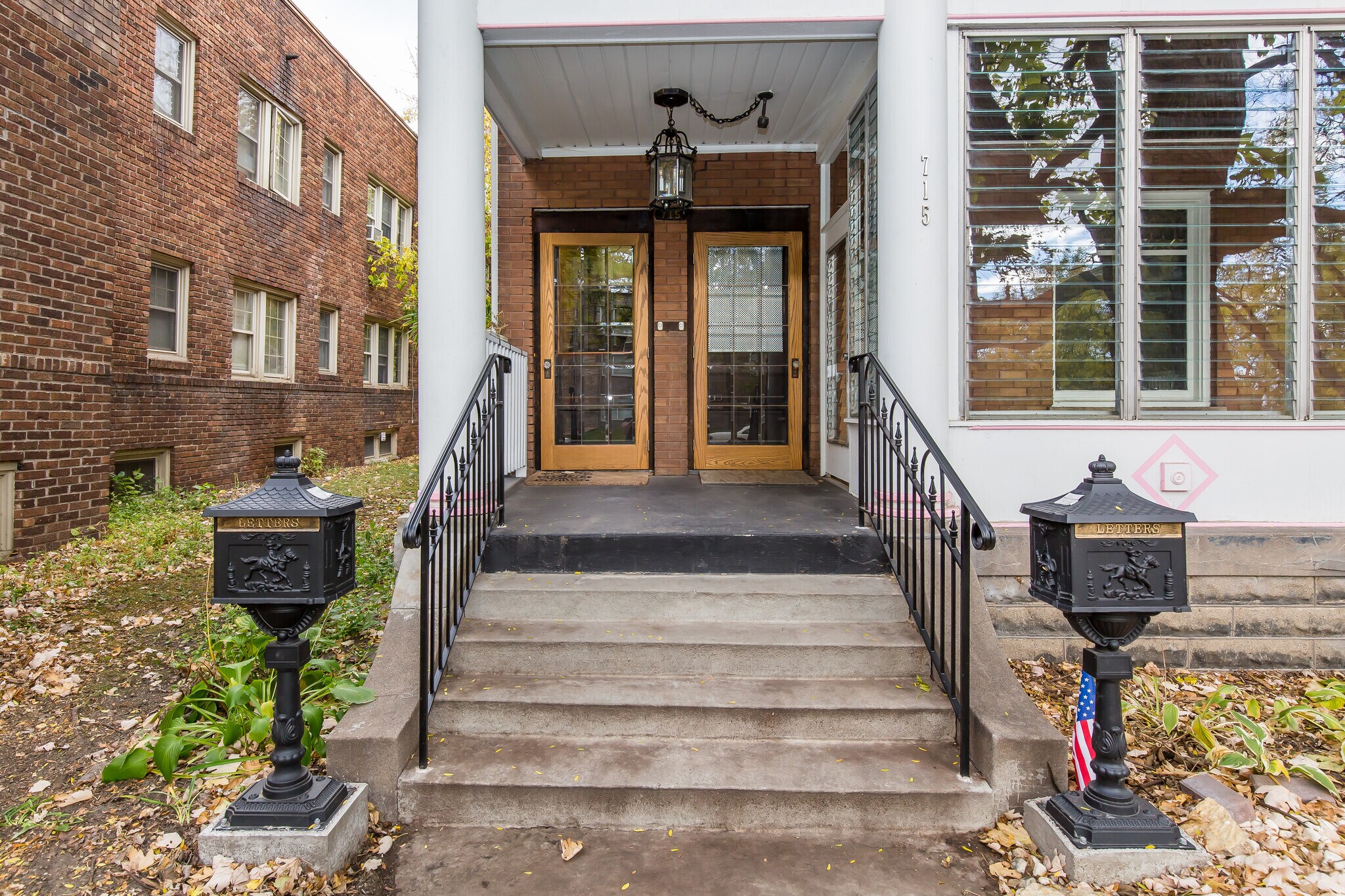 Front Entrance Restored with Antique Storm Doors and Lantern - 715 5th St SE
