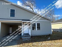 Building Photo - Open floor living in this two level townhome