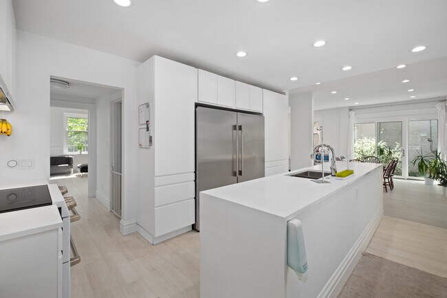 Industrial size, side-by-side freezer and refrigerator. - 31 Dartford Ave
