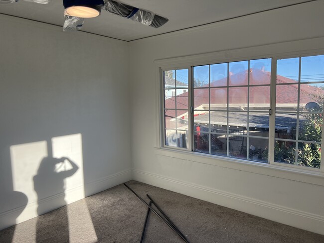 Bedroom 1 with lots of sunlight - 1509 39th Ave