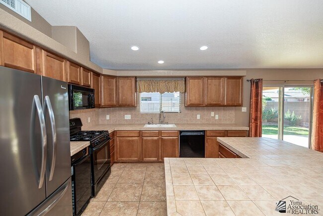 Building Photo - 11845 E 27th Pl