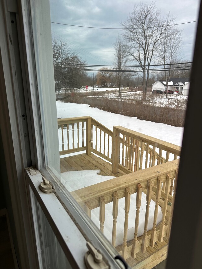 Front porch from living room bedroom. - 8215 Lake Pleasant Rd