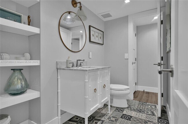 Building Photo - 5555 Collins Ave