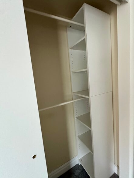 Bedroom closet - shelves and bars - 73 F St E