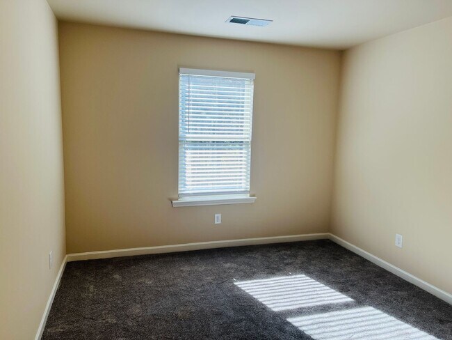 Building Photo - Wow! Check out this charming 3-bedroom, 2....