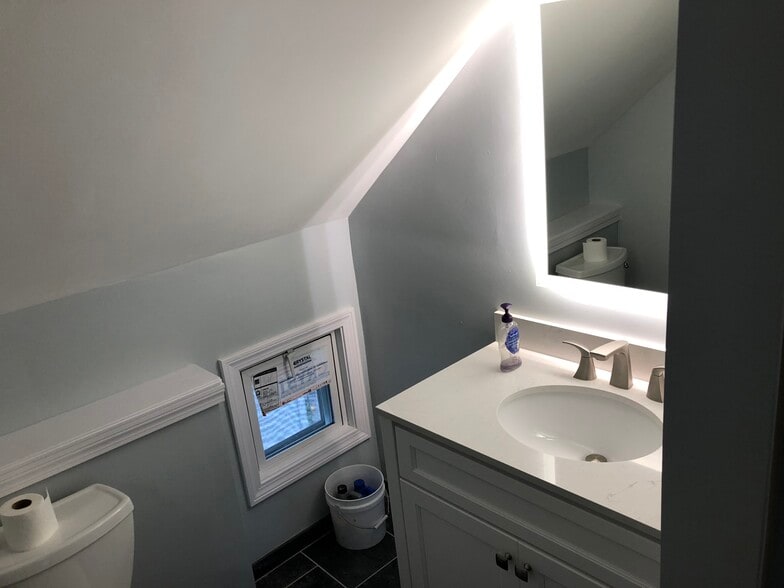 Bathroom LED mirror has touch activated defogging and 3-level light control features. - 16 Tecumseh Street