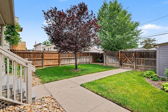 Building Photo - Beautifully Preserved Englewood Home with Fenced Backyard