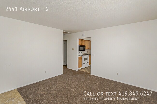 Building Photo - 2441 Airport-2