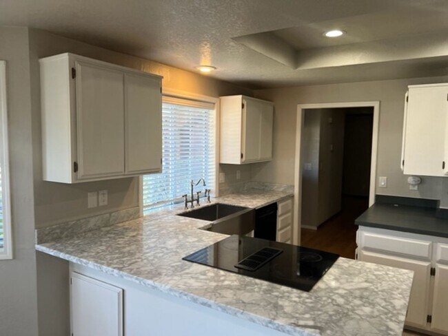 Building Photo - SINGLE LEVEL HOME W/ MANICURED YARD WITH  ...