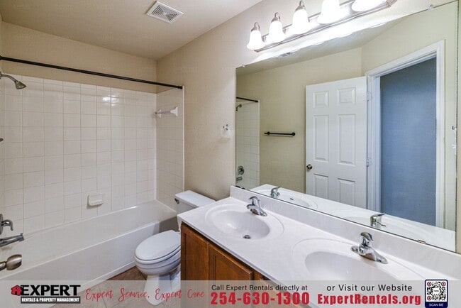 Building Photo - Enchanting 4-bedroom, 2-bathroom home nest...