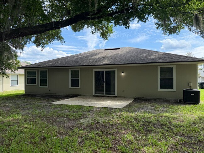 Building Photo - COMING SOON - Secret Harbor Three Bedroom Home