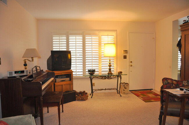 Pre-refurbished Living Room with furniture for spatial reference - 285 S Sierra Madre Blvd