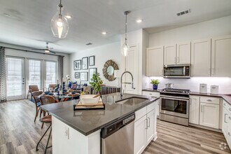 Building Photo - Move-In Special: One Month Free!