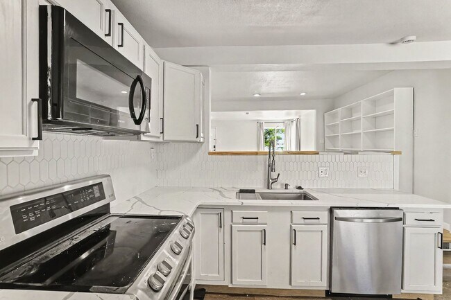 Building Photo - Charming Harvey Park Home with Large Yard & Fireplace