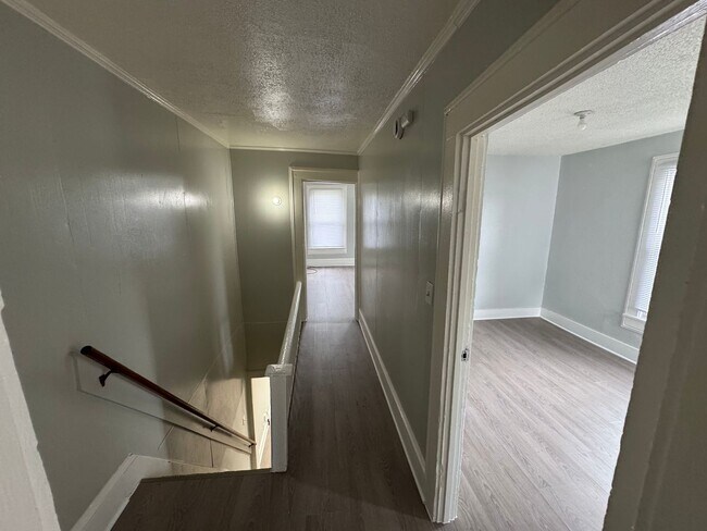 Building Photo - Interested in a two-bedroom house that includes a large garage. Please let us know