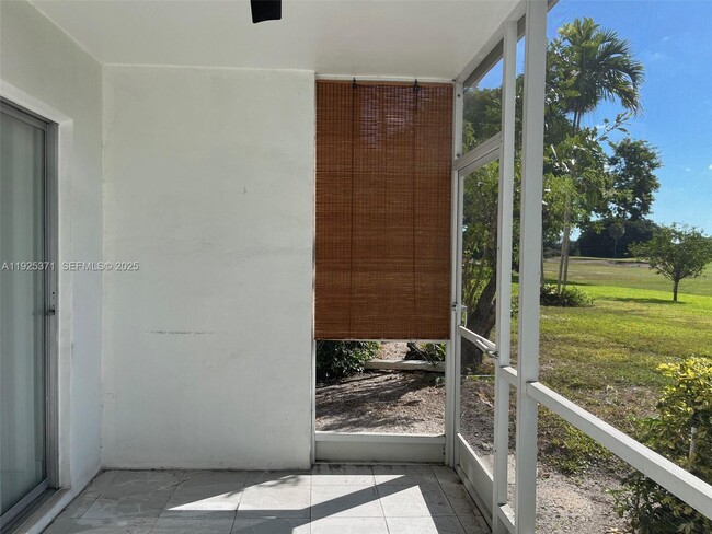 Building Photo - 3100 N Palm Aire Dr