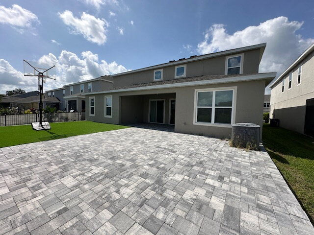 Building Photo - "Spacious Elegance in St. Cloud: 5-Bedroom...