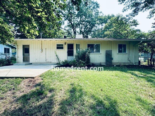 Building Photo - Attractive Prairie Village Ranch w/ FRESH PAINT, Wood Floors, Granite Counters and a Fenced Yard!