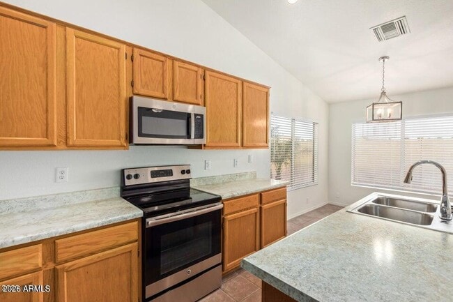 Building Photo - 6585 N 77th Dr