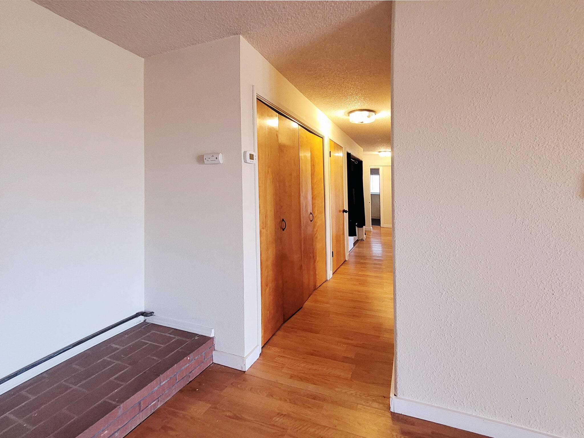 Hallway with closet and laundry - 649 N Hayes St