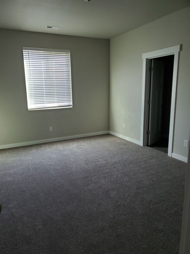 Building Photo - Newer Home with Garage & Fenced Yard