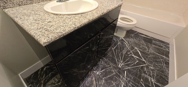 Building Photo - Short walk to Longwood! Steps to T! Large 1 bedroom w/enclosed porch! Garage parking incl.